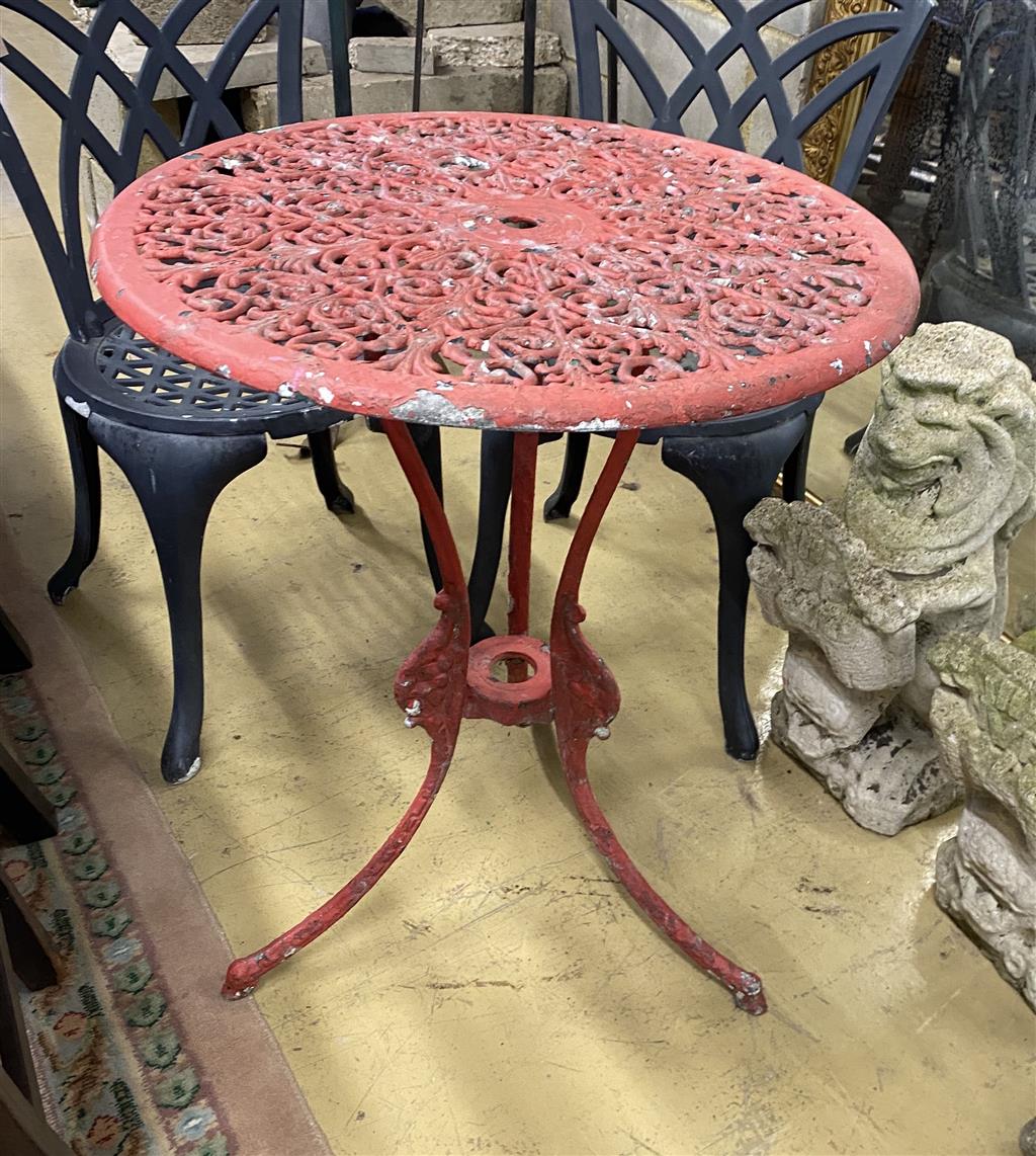 A circular painted aluminium garden table, 60cm diameter together with two garden chairs